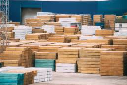 Stacked Timber In Stock. Many Industrial Lumber Material Storage Outdoors